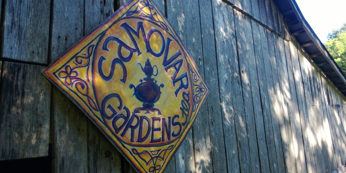 The original Samovar Gardens sign on the Farm 