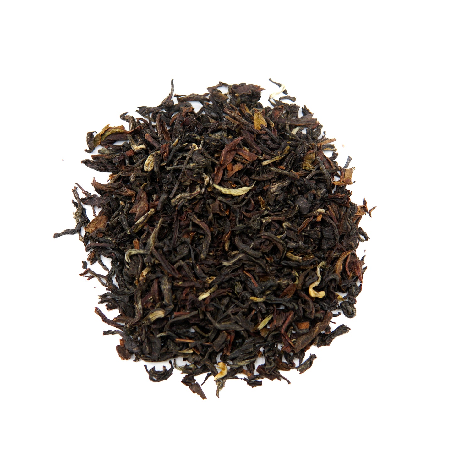 A pile of Piper and Leaf Tea Co. “Afternoon Darjeeling 40 Serving Loose Leaf” tea from the Heritage Collection is arranged in a circular shape on a white background.